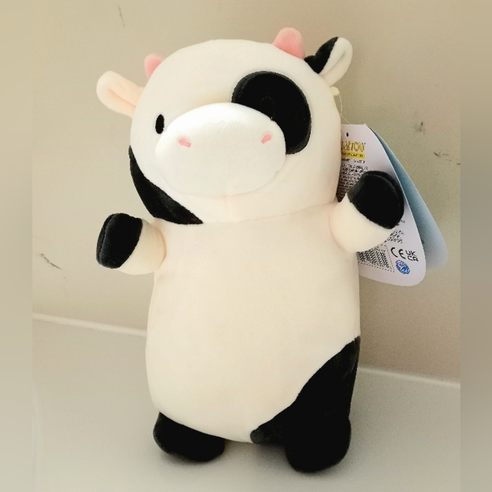 Squishmallow Conner the Cow hugmees